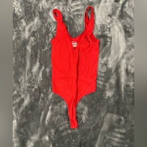 Red body suit